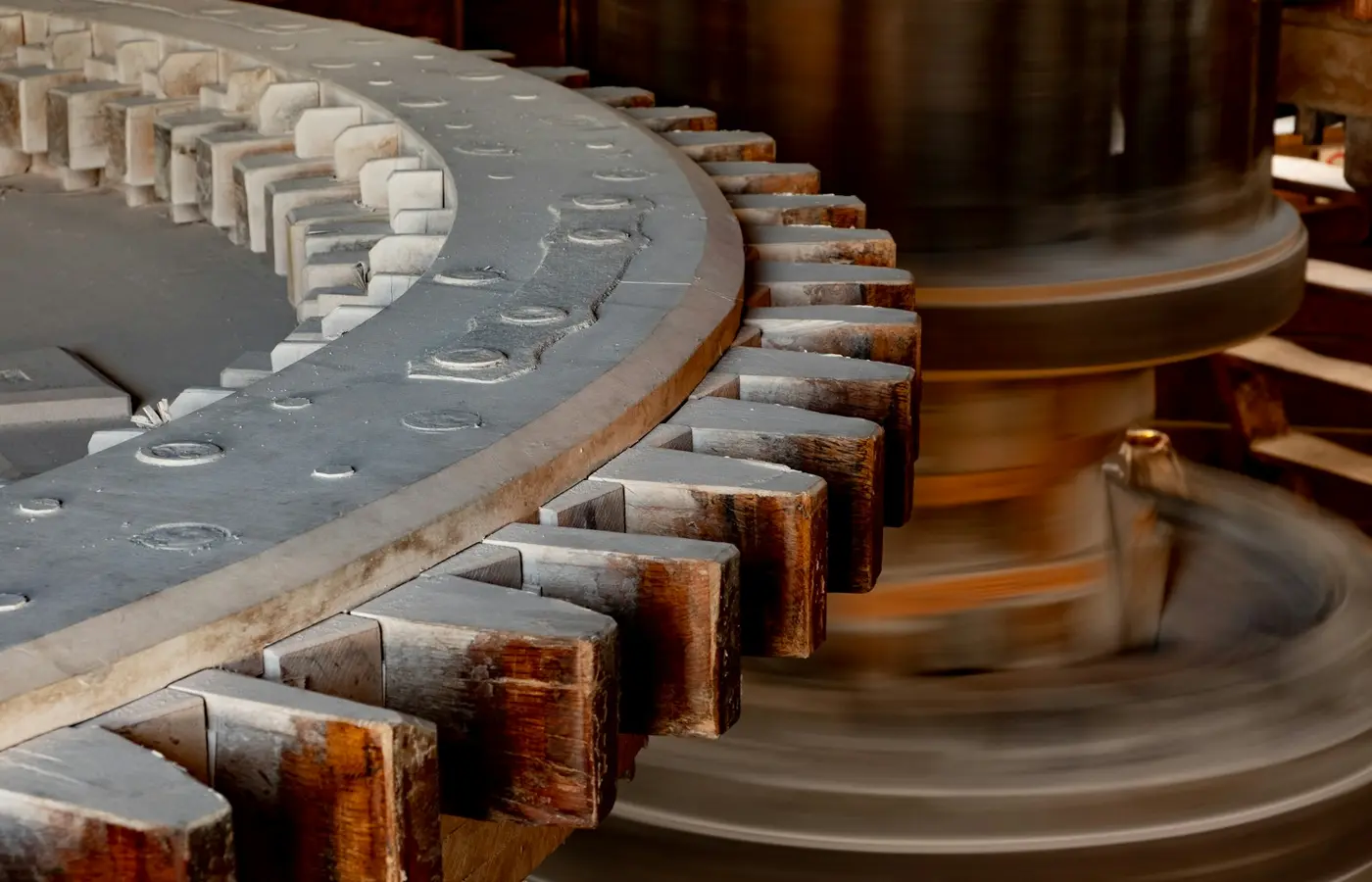 Illustration of grease being applied to an industrial bearing