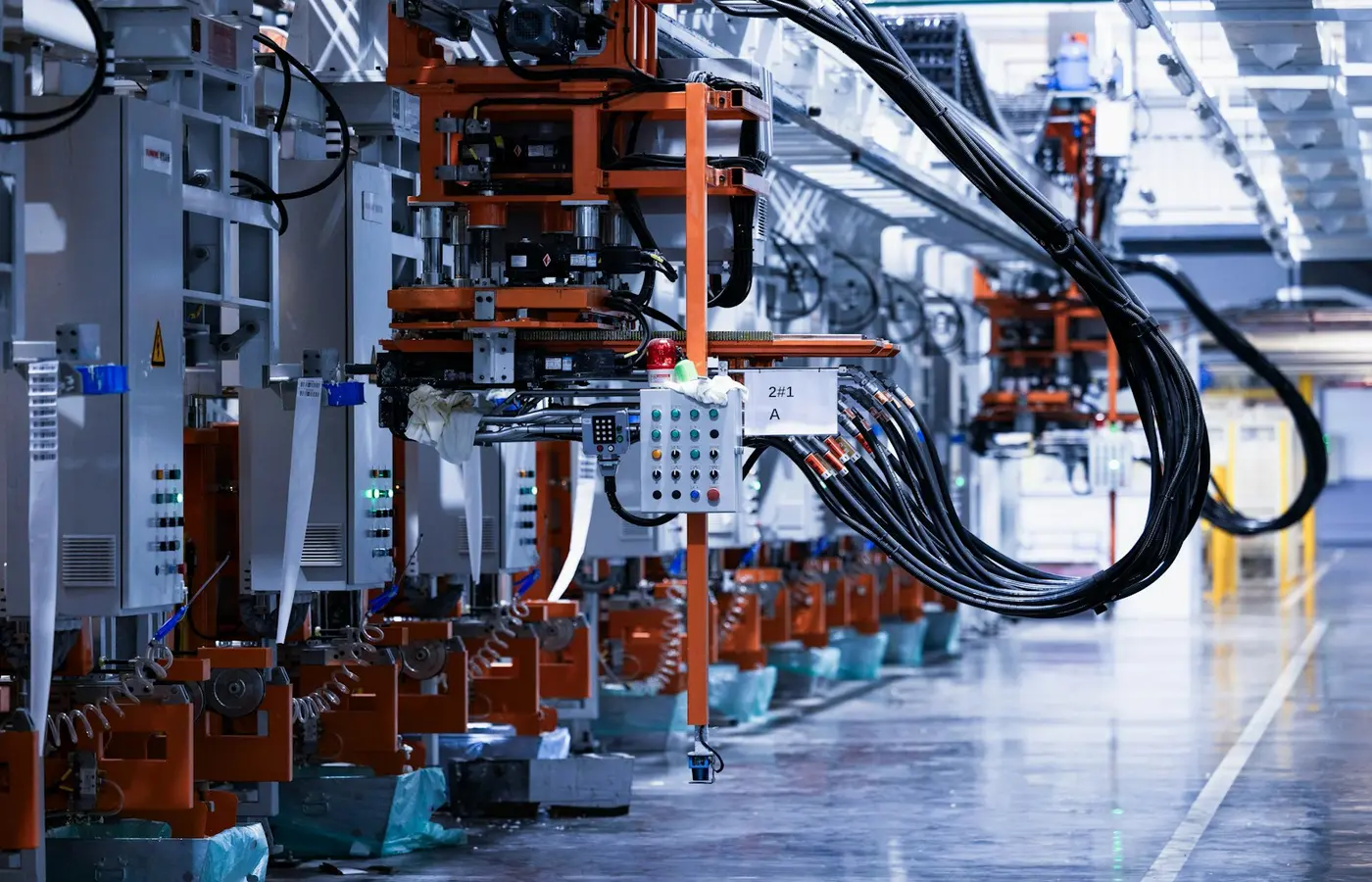 Factory equipment being checked against a pre-shipment functional test checklist and acceptance criteria.