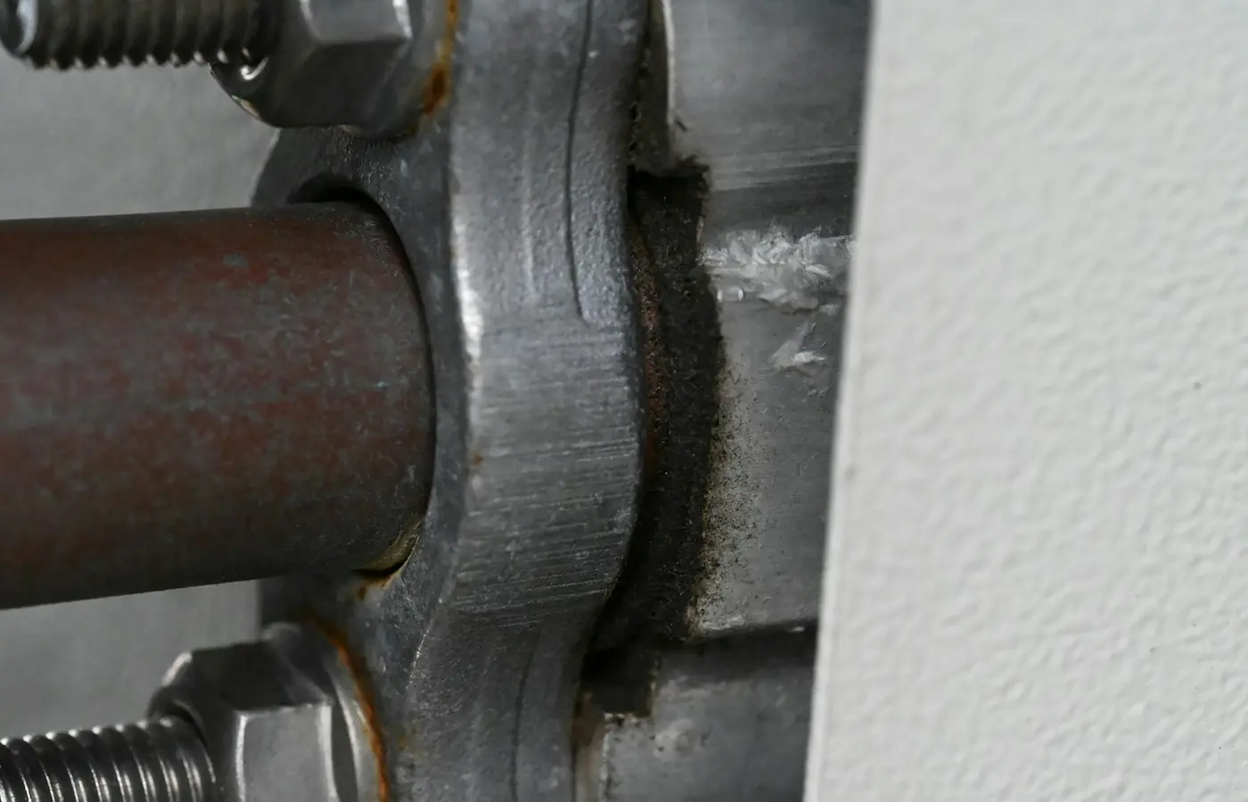 Industrial bearing inspection showing surface damage on a rolling bearing