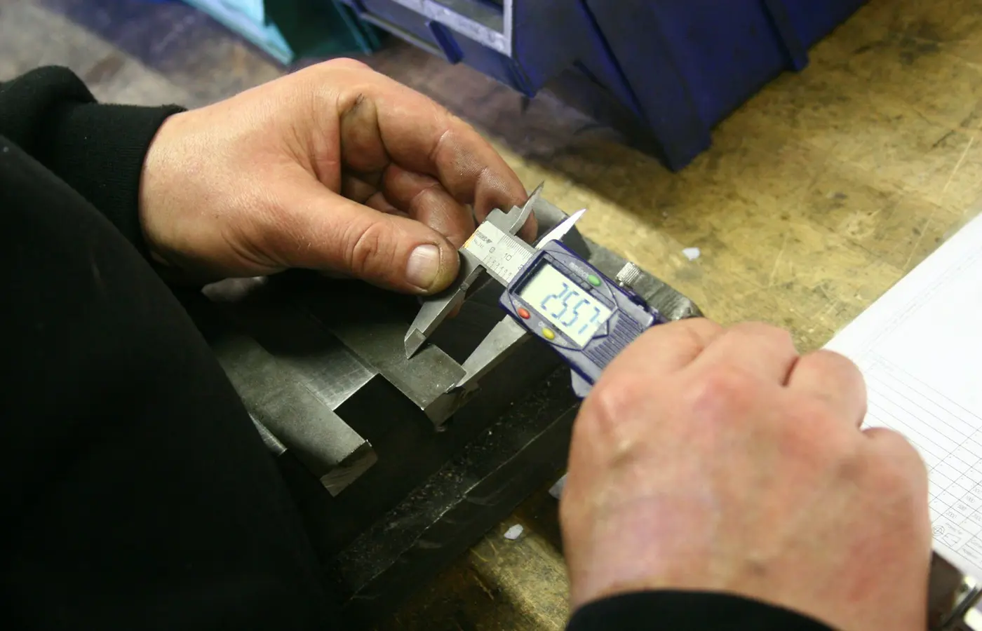 Industrial equipment nameplate and certification mark being checked during incoming inspection